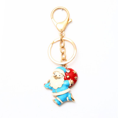 

Lotus E GOLDEN & CRYSTALS METALLIC SKY BLUE SANTA CLAUS WITH SLEIGH Key Chain