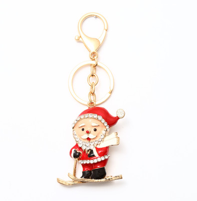 

Lotus E GOLDEN & CRYSTALS METALLIC RED SANTA CLAUS WITH SLEIGH Key Chain