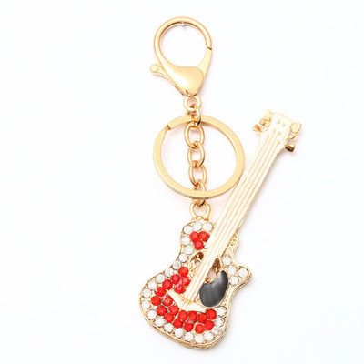 

Lotus E GOLDEN & CRYSTALS METALLIC RED GUITAR Key Chain