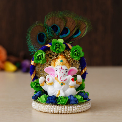 eCraftIndia Lord Ganesha Idol on Handcrafted Floral Plate with Peocock Feather Decorative Showpiece  -  13 cm(Polyresin, Blue)