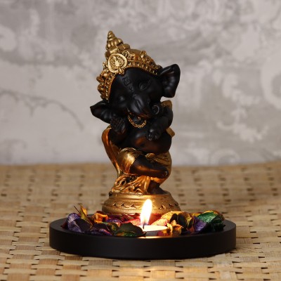 eCraftIndia Golden and Black Lord Ganesha Dancing Avatar Decorative with Wooden Base, Fragranced Petals and Tealight Decorative Showpiece  -  17 cm(Wood, Multicolor)