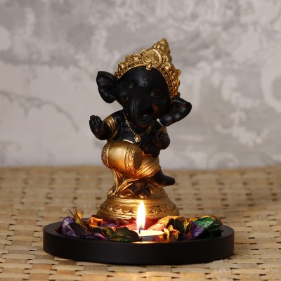 eCraftIndia Golden and Black Lord Ganesha Dancing Avatar Decorative with Wooden Base, Fragranced Petals and Tealight Decorative Showpiece  -  16.5 cm(Wood, Gold)