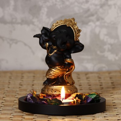 eCraftIndia Golden and Black Lord Ganesha Dancing Avatar Decorative with Wooden Base, Fragranced Petals and Tealight Decorative Showpiece  -  15.5 cm(Wood, Gold)