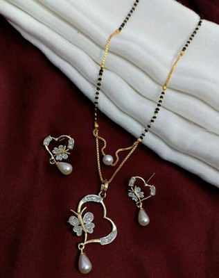 Jewel GALLERY Alloy Gold-plated White, Black Jewellery Set(Pack of 1)