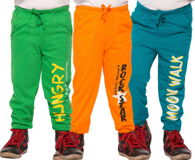 green and orange track pants