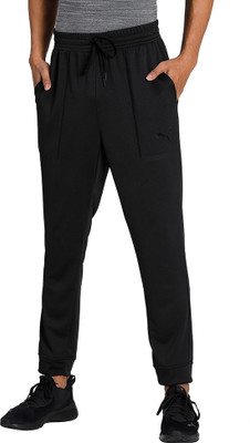 PUMA TRAIN TECH KNIT JOGGER Solid Men Black Track Pants