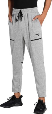 PUMA TRAIN TECH KNIT JOGGER Solid Men Grey Track Pants