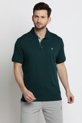 VAN HEUSEN Solid Men Polo Neck Dark Green T-Shirt