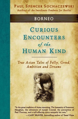 Curious Encounters of the Human Kind - Borneo(English, Paperback, Sochaczewski Paul Spencer)