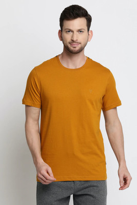 VAN HEUSEN Solid Men Round Neck Yellow T-Shirt