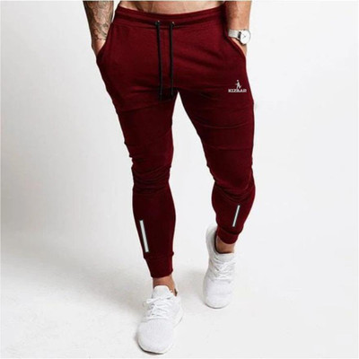 KIZAAR Solid Men Maroon Track Pants