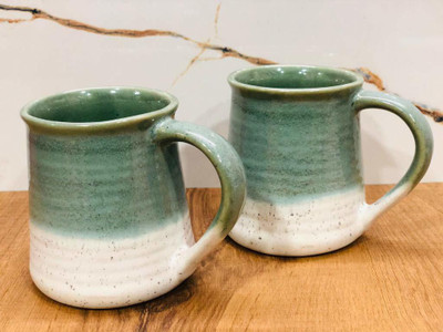 Hindustani Saudagar Ceramic Handcrafted Dual Glazed Sea Green Studio Pottery Glossy with Matt Finish on Bottom Tea / Coffee Set of 2 ( 320 ML , Microwave & Dishwasher Safe) Ceramic Coffee Mug(320 ml, Pack of 2) Hindustani Saudagar Ceramic Handcrafted Dual Glazed Sea Green Studio Pottery Glossy with Matt Finish on Bottom Tea / Coffee Set of 2 ( 320 ML , Microwave & Dishwasher Safe) Ceramic Coffee Mug(320 ml, Pack of 2)