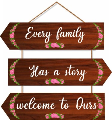 Crafts World Every Family Has a Story Welcome To Ours Wall Hanging Board Plaque Sign for Room Decoration Decorative Showpiece(25 cm X 30 cm, Multicolor)