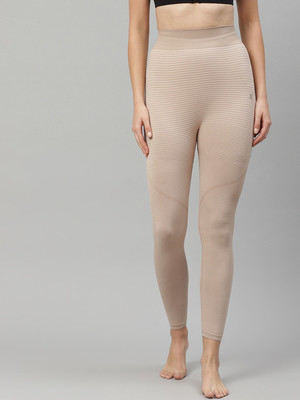 74 OFF on HRX by Hrithik Roshan Striped Women Beige Tights on