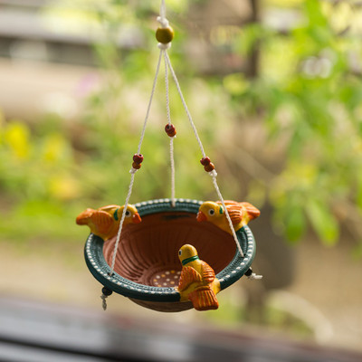 17% OFF on ExclusiveLane Terracotta Handpainted Tray Bird Feeder(Multicolor)