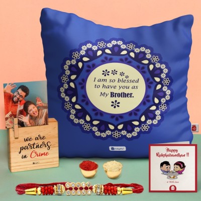 Indigifts Designer 0D-0CM114-0BRO-Y16-D024 Assorted Photo Frame, Cushion, Chawal Roli Pack, Rakhi  Set(1 Cushion Cover 12X12 Inches, 1 Photo Magnetic Frame, 1 Designer Rakhi, 1 Greeting Card)