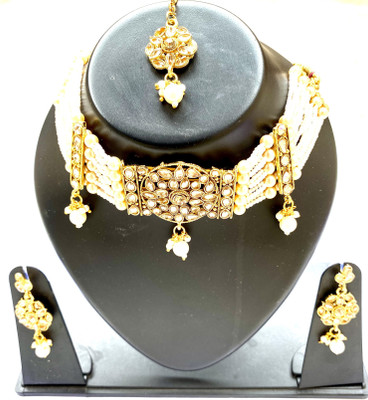 NIKYANKA Brass Gold-plated White Jewellery Set(Pack of 1)