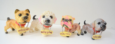 ONRR Collections welcome dogs set-of-4 multicoloured decorative showpiece Decorative Showpiece  -  5 cm(Polyresin, Multicolor)