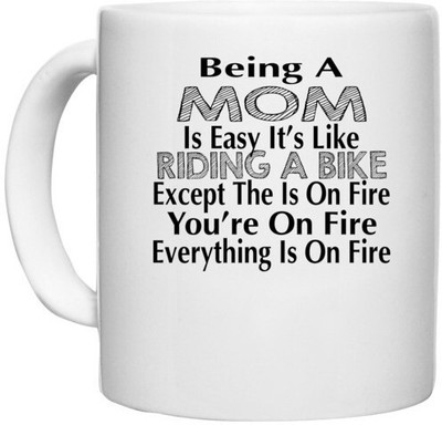 UDNAG White Ceramic Coffee / Tea 'Mother | being a mom is easy it's like' Perfect for Gifting [330ml] Ceramic Coffee Mug(330 ml)