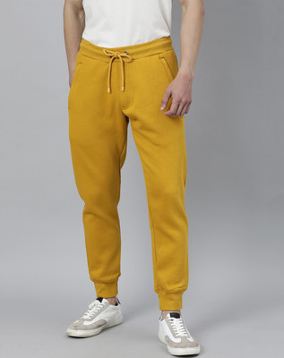 Rare Rabbit Solid Men Yellow Track Pants