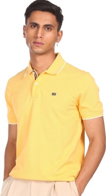 Arrow Sport Solid Men Polo Neck Yellow T-Shirt