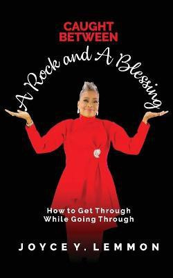 Caught Between A Rock and A Blessing(English, Paperback, Lemmon Joyce L)