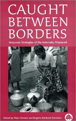 Caught Between Borders(English, Paperback, unknown)