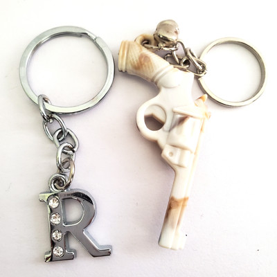 ShopTalk Marble Finish Revolver Gun With Letter R Key Chain
