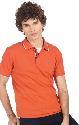 ARROW Solid Men Polo Neck Orange T-Shirt