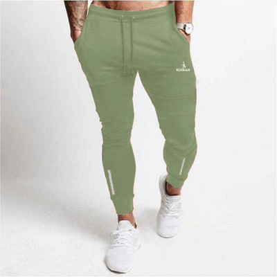 KIZAAR Solid Men Light Green Track Pants
