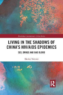 Living in the Shadows of China's HIV/AIDS Epidemics(English, Paperback, Torcetti Shelley)