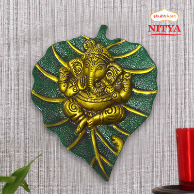 Shubhkart Nitya Lord Ganesha On Paan Leaf Wall Hanging- 177 g Decorative Showpiece  -  19 cm(Metal, Yellow)