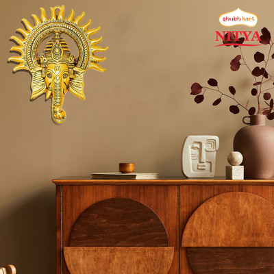 Shubhkart Nitya Wall Hanging Surya Kiran Ganesha Decorative Showpiece - 238 g Decorative Showpiece  -  22.8 cm(Metal, Yellow)