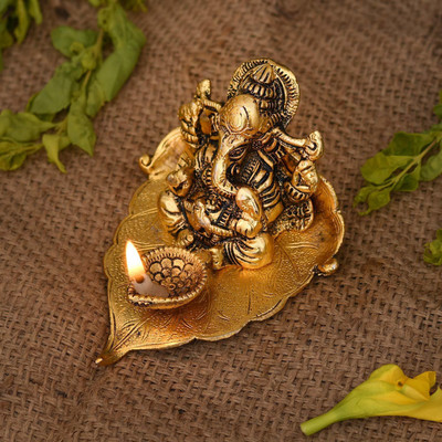 Koolwal craft Ganesh Sitting On Pipal Leaf With Diya Metal Statue Decorative Showpiece  -  12 cm(Metal, Gold)