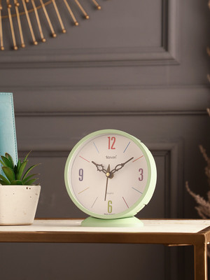 Exim Decor Green Round Mini Analog Table Clock Decorative Showpiece  -  14 cm(Plastic, Green)