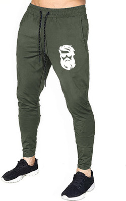 AVOLT Solid Men Green Track Pants