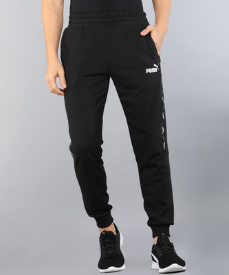 PUMA ESS+ Tape Sweatpants Solid Men Black Track Pants