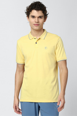 VAN HEUSEN Solid Men Polo Neck Yellow T-Shirt