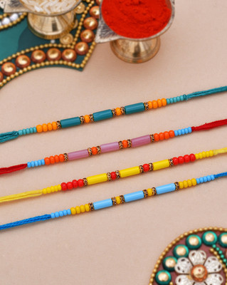 Voylla Thread Set of 4
Colorful Beads embedded Rakhi Mauli Thread Chawal Roli Pack  Set(Pack Of 4)