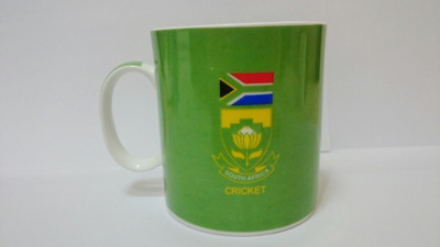 

Indigo Creatives Official ICC T 20 Cricket World Cup South Affrica Team Logo Ceramic Coffee Ceramic Mug(330 ml)