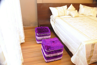 

Midha Groups Fabric Pouf(Finish Color - Purple)