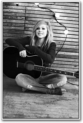 

Avril Lavigne with Guitar Paper Print(18 inch X 12 inch)