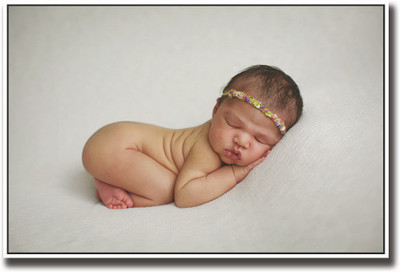 

Cute baby with a cute hair band Fine Art Print(12 inch X 18 inch, Rolled)