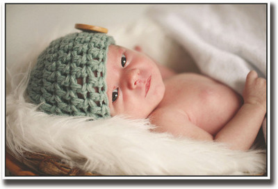 

Baby with button cap looking Fine Art Print(12 inch X 18 inch, Rolled)