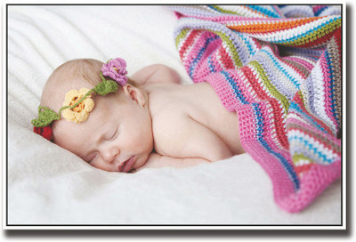 

Cute baby with colorful crown Fine Art Print(12 inch X 18 inch, Rolled)