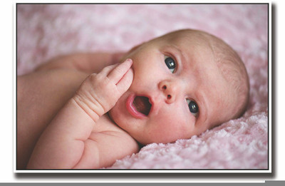 

Posterhouzz Cute baby amused Fine Art Print(12 inch X 18 inch, Rolled)