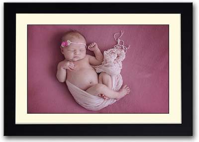

Cute Baby Sleeping On A Pink Carpet Fine Art Print(14 inch X 20 inch, Framed)