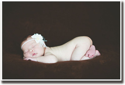 

Cute baby sleeping on brown Fine Art Print(12 inch X 18 inch, Rolled)