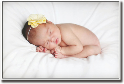 

Posterhouzz Baby with yellow flower Fine Art Print(12 inch X 18 inch, Rolled)