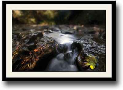 

Water flowing through rocks Fine Art Print(10 inch X 14 inch, Framed)